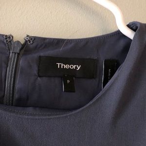 Theory: navy fitted top with side slit.